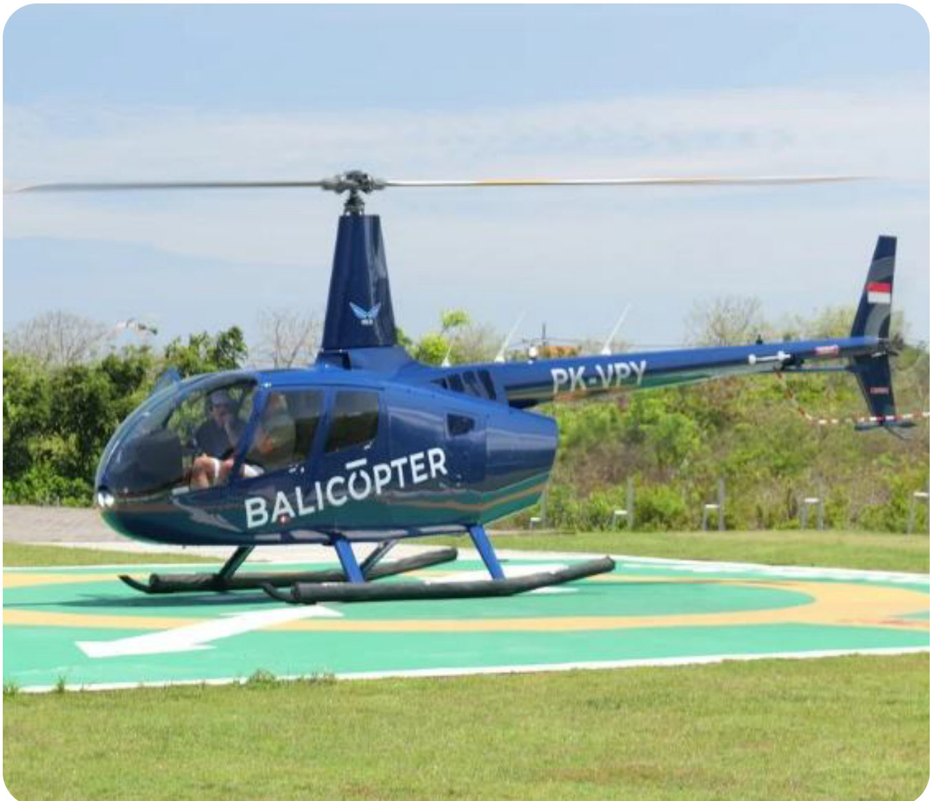 Robinson 66 on the helipad